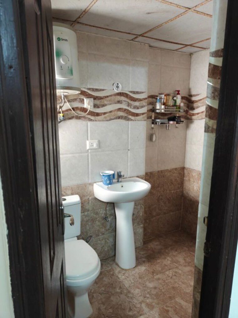 Bathroom, jkg-palm-court 2 Bedroom 1090 Sq.Ft. Apartment In Sector 16c Greater Noida Greater Noida 10231356