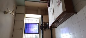 Kitchen in 2 BHK Apartment at Pooja Sankul Apartment, Aundh – for Rent