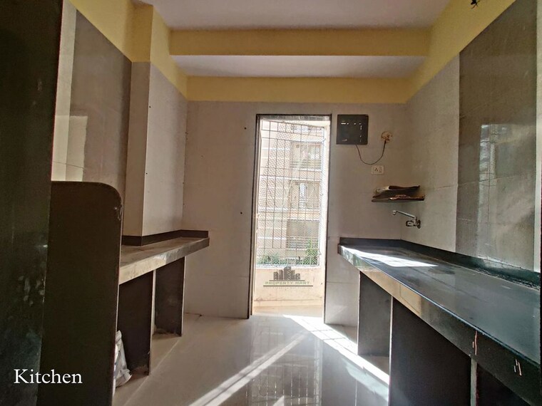 Kitchen, vasudev-planet 2 Bedroom 945 Sq.Ft. Apartment In Mira Road Thane 10230799