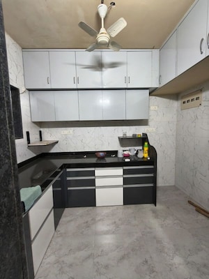 Kitchen in 3 BHK Apartment at Belaire Mansion, Camp – for Sale