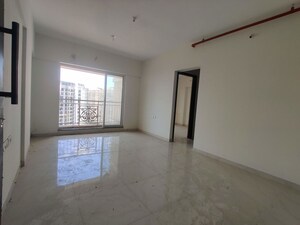 Living Room in 2 BHK Apartment at Rassaz Greens, Mira Road – for Rent