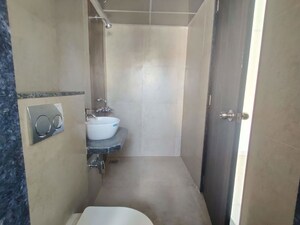 Bathroom in 2 BHK Apartment at Rassaz Greens, Mira Road – for Rent