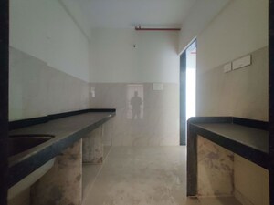 Kitchen in 2 BHK Apartment at Rassaz Greens, Mira Road – for Rent