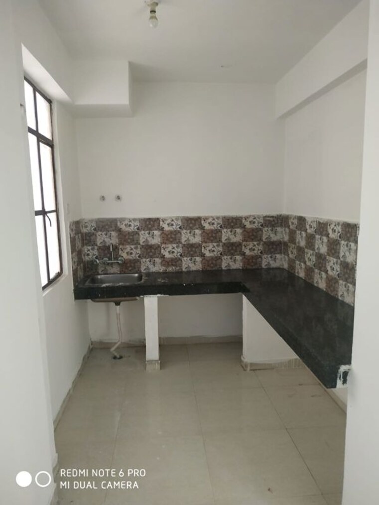 Kitchen, signature-global-synera 2 Bedroom 735 Sq.Ft. Apartment In Sector 81 Gurgaon 10231849