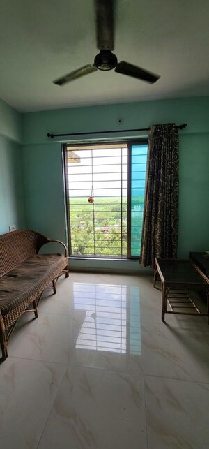 Living Room in 1 BHK Apartment at Dss Mahavir Estella, Ghodbunder Road – for Rent