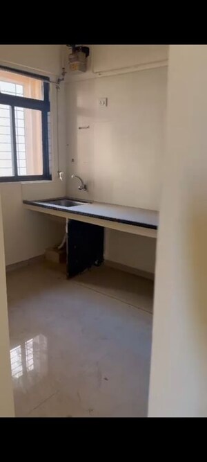 Kitchen in 1 BHK Apartment at Om Sai Plaza, Ghodbunder Road – for Rent