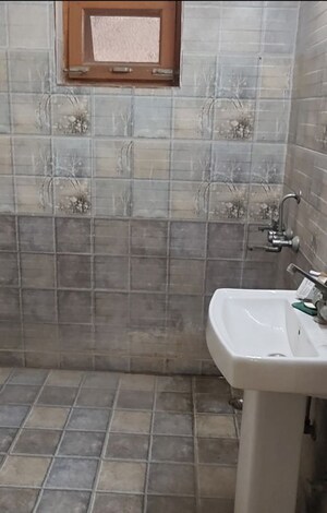 Bathroom in 4 BHK Builder Floor at Ashoka Enclave – for Rent