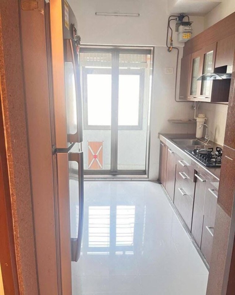 Kitchen, raymond-codename-beyond 2 Bedroom 1058 Sq.Ft. Apartment In Pokhran Road No One Thane 10232231