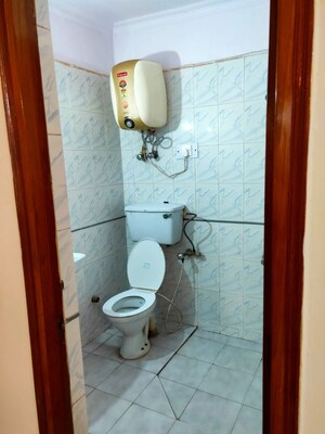 Bathroom in 2 BHK Apartment at Windsor and Nova Society, Ahinsa Khand 2 – for Rent