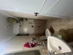 Bathroom in 1 BHK Apartment at Siddharth Nagar CHS, Borivali East – for Rent