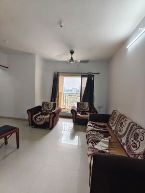 Living Room in 2 BHK Apartment at Cosmos Jewels, Ghodbunder Road – for Rent