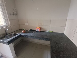 Kitchen in 2 BHK Apartment at Tata Eureka Park, Sector 150 – for Rent