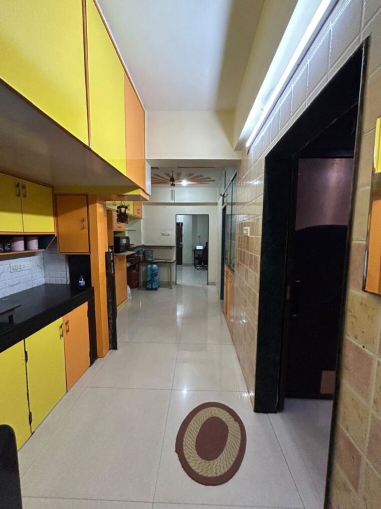 Kitchen, wadgaon sheri 2 Bedroom 950 Sq.Ft. Apartment In Wadgaon Sheri Pune 10232481