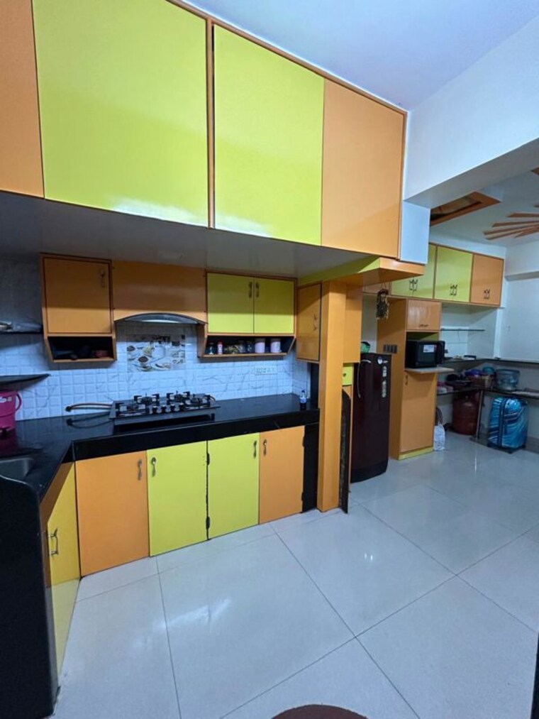 Kitchen, wadgaon sheri 2 Bedroom 950 Sq.Ft. Apartment In Wadgaon Sheri Pune 10232481