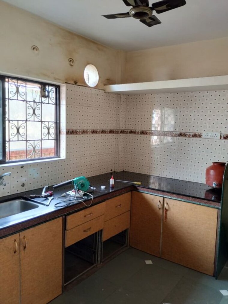Kitchen, wadgaon sheri 2 Bedroom 950 Sq.Ft. Apartment In Wadgaon Sheri Pune 10232498