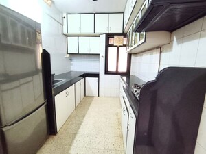 Kitchen in 3 BHK Apartment at Acme Ozone, Manpada – for Rent