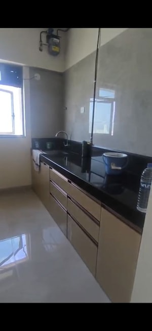 Kitchen in 1 BHK Apartment at Sheth Irene, Malad West – for Rent