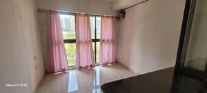 Living Room in 1 BHK Apartment at Lodha Quality Home Tower 5, Majiwada – for Rent