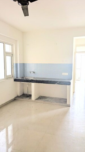 Kitchen in 2 BHK Apartment at ROF Aalayas, Sector 102 – for Sale