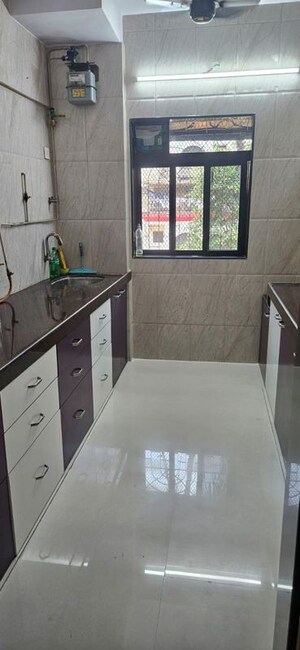 Kitchen in 2 BHK Apartment at Dhaval Sunrise Orlem 2B Phase 3, Malad West – for Rent