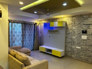 Living Room in 2 BHK Apartment at Goyal And Co Orchid Woods, Hennur – for Rent