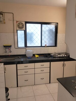 Kitchen in 3 BHK Apartment at Amrut Runwal Daffodils, Nibm – for Rent