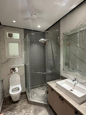 Bathroom in 4 BHK Builder Floor at DLF Atria, Dlf Phase ii – for Rent