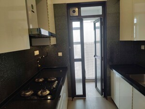 Kitchen in 3 BHK Apartment at Lodha Aria, Parel – for Rent