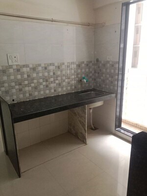 Kitchen in 1 BHK Apartment at Shree Krishna Heights Juchandra, Naigaon East – for Rent