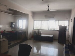 Living Room in 2 BHK Apartment at Camac Street – for Sale