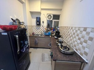 Kitchen in 1 BHK Apartment at Gaur City 2 - 10th Avenue, Sector 16c Greater Noida – for Rent
