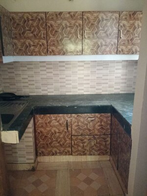 Bedroom in 1.5 BHK Builder Floor at RWA Apartments Sector 26, Sector 26 – for Rent