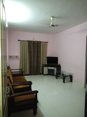 Living Room in 2 BHK Apartment at Wadgaon Sheri – for Sale