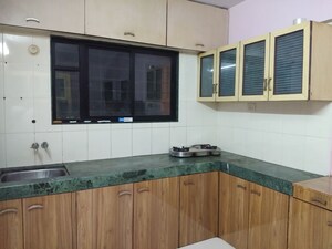 Kitchen in 2 BHK Apartment at Wadgaon Sheri – for Sale