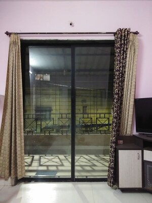 Living Room in 2 BHK Apartment at Wadgaon Sheri – for Sale