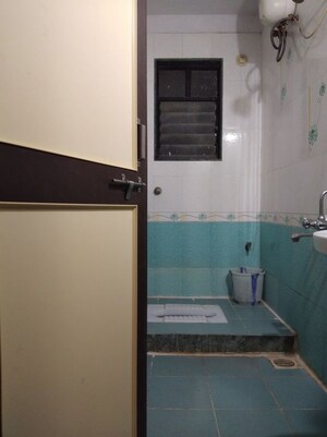 Bathroom in 2 BHK Apartment at Wadgaon Sheri – for Sale