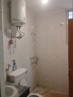 Bathroom in 3 BHK Apartment at Ansal Executive Residency, Sushant Lok ii – for Rent