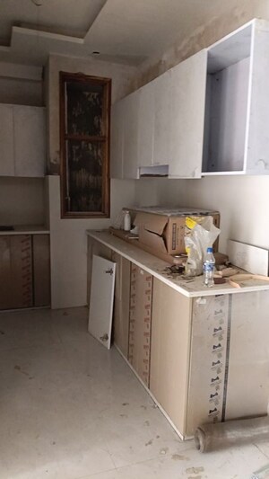 Kitchen in 4 BHK Builder Floor at Shalimar Garden Extension I – for Sale