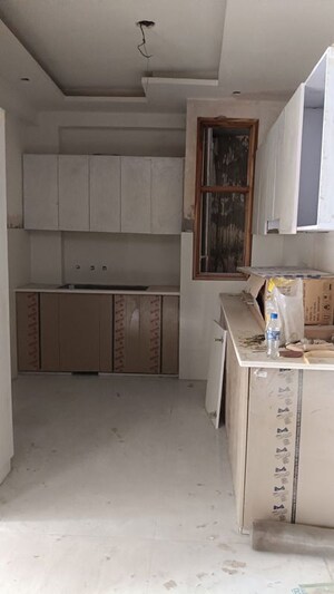 Kitchen in 4 BHK Builder Floor at Shalimar Garden Extension I – for Sale