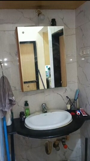 Bathroom in 1 BHK Apartment at Green Fields Apartment, Andheri East – for Rent
