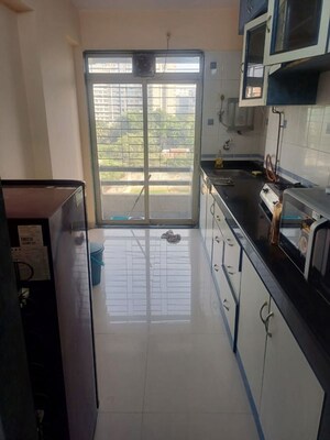 Kitchen in 3 BHK Apartment at Awesome Heights, Andheri East – for Rent