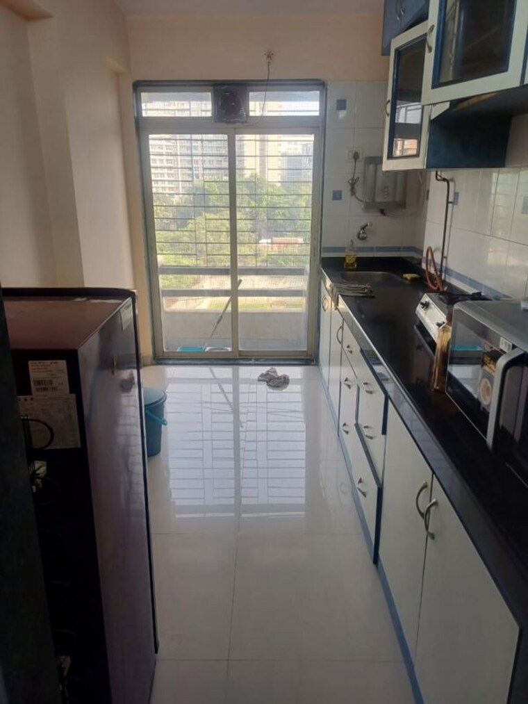 Kitchen, awesome-heights 3 Bedroom 1050 Sq.Ft. Apartment In Andheri East Mumbai 10233065