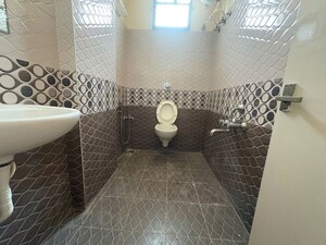 Bathroom in 3 BHK Apartment at Ramanashree California Garden, Yelahanka – for Rent