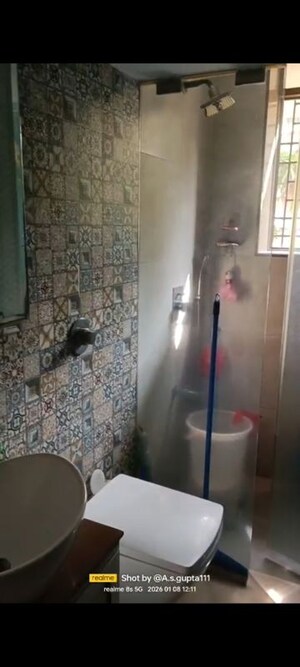 Bathroom in 2 BHK Apartment at Trishul CHS, Andheri West – for Rent