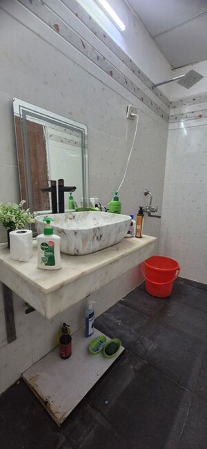 Bathroom in 3 BHK Builder Floor at KLJ Noida One, Sector 62 – for Rent