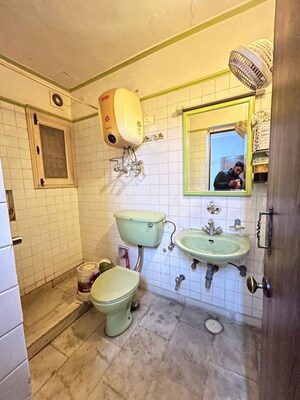 Bathroom in 4 BHK Apartment at Vasant Kunj – for Rent