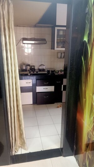 Kitchen in 2 BHK Apartment at Siddhanchal CHS, Pawar Nagar – for Rent