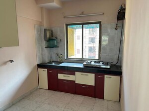 Kitchen in 2 BHK Apartment at RNA Regal, Kandivali West – for Rent