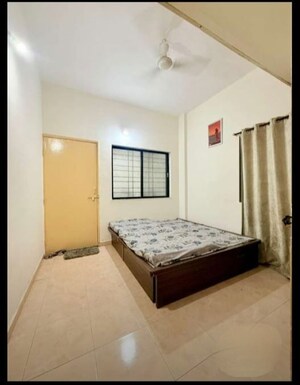 Bedroom in 2 BHK Apartment at Dhanori – for Rent