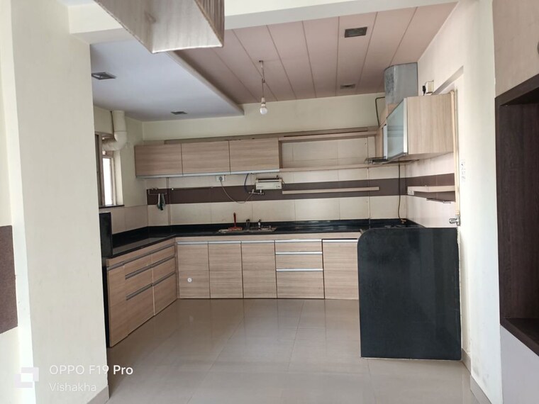 Kitchen, uttam-townscapes 2 Bedroom 1100 Sq.Ft. Apartment In Yerawada Pune 10233237